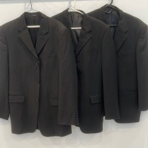 3 suit jackets for $25! One pinstriped and the other two are black. Size Medium.